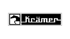 Schwarzes Logo von Krämer mit einem springenden Pferd auf grünem Hintergrund.