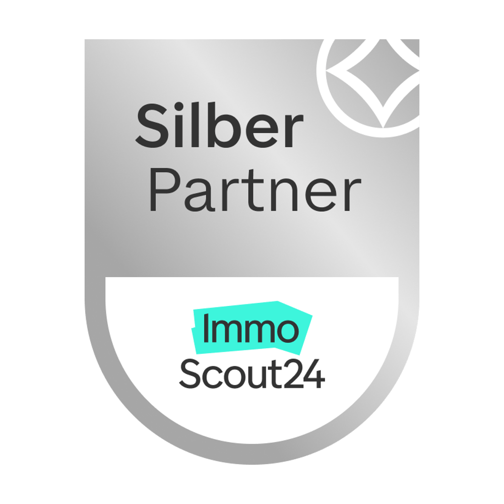Domizil Immobilien ist Silberner Partner-Badge mit "Silber Partner" und ImmoScout24-Logo.