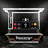 ALLCAP Solutions display stand with various baseball caps, a screen, and LED lighting.