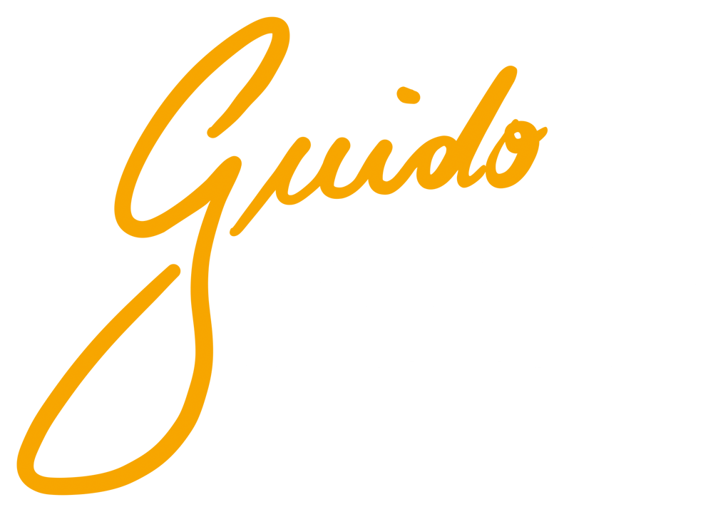 Guido Schmitz-Logo mit orangefarbenem Guido-Schriftzug und weißem Schmitz in eckigem Rahmen auf grünem Hintergrund.
