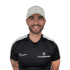 Lächelnder Mann mit weißer Kappe und schwarzem T-Shirt mit "C.D. Individualtraining" Logo.