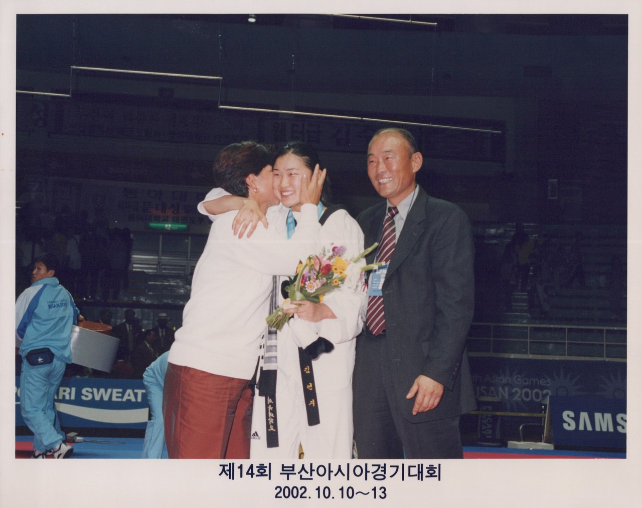 Busan 2002: Asienspiele in Korea – Großmeister Kim mit Tochter YeonJi nach ihrem Sieg