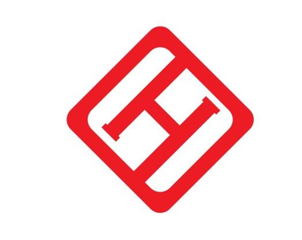 Roter Bär-Logo mit schwarzem Text „STORZ HEIZTECHNIK KOMPLETTBAD“.