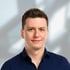 Headshot von Alexander Schefstoss, der zweite der beiden Gründer und Geschäftsführer von ATLAS Operations.