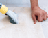 Deep cleaning of a white carpet in Raleigh – Aclean Steamers ensures thorough stain and dirt removal with professional equipment