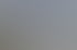 Von der Firma BIZZZ Elztal: Moderne Gebäudeansicht mit großem vertikalem BIZZZ-Schriftzug, Holz- und Glasfassade unter strahlend blauem Himmel
