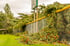 Fallen tree branches across a collapsed fence line, typical fence storm damage in Allen, TX