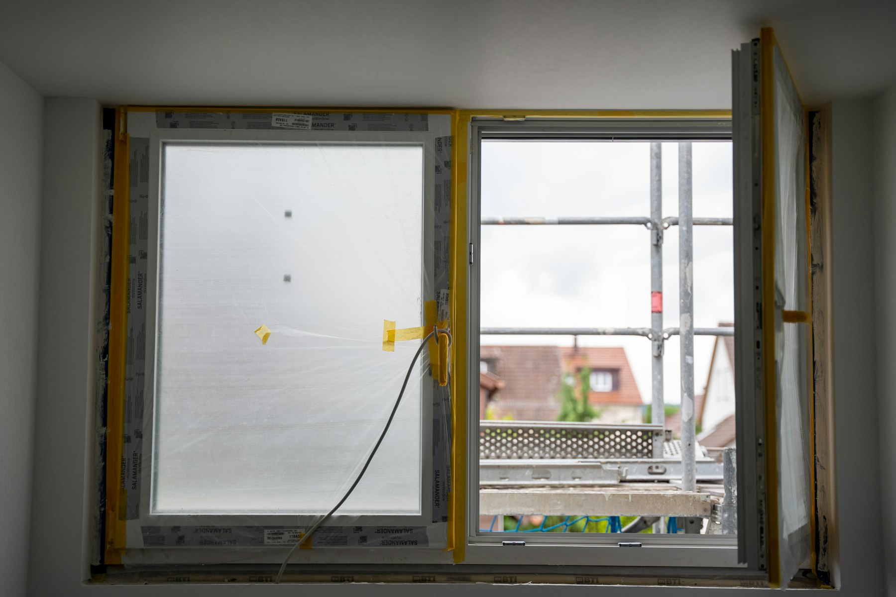 New replacement window being set and sealed into a Sunnyvale home