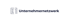 Dunkelblaues E1-Logo mit dem Schriftzug Unternehmernetzwerk auf schwarzem Hintergrund.