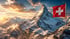 Schweizer Flagge weht vor dem schneebedeckten Matterhorn bei Sonnenuntergang.