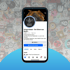 Krispy Kebab Facebook Seite auf einem Smartphone vor Krispy Kebab Logo-Wand