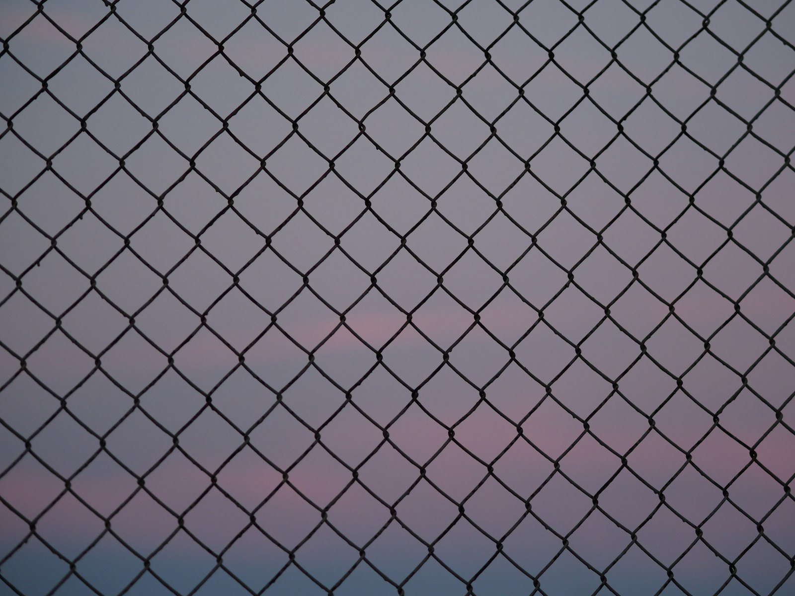 Commercial perimeter security fence at a Howard County business park