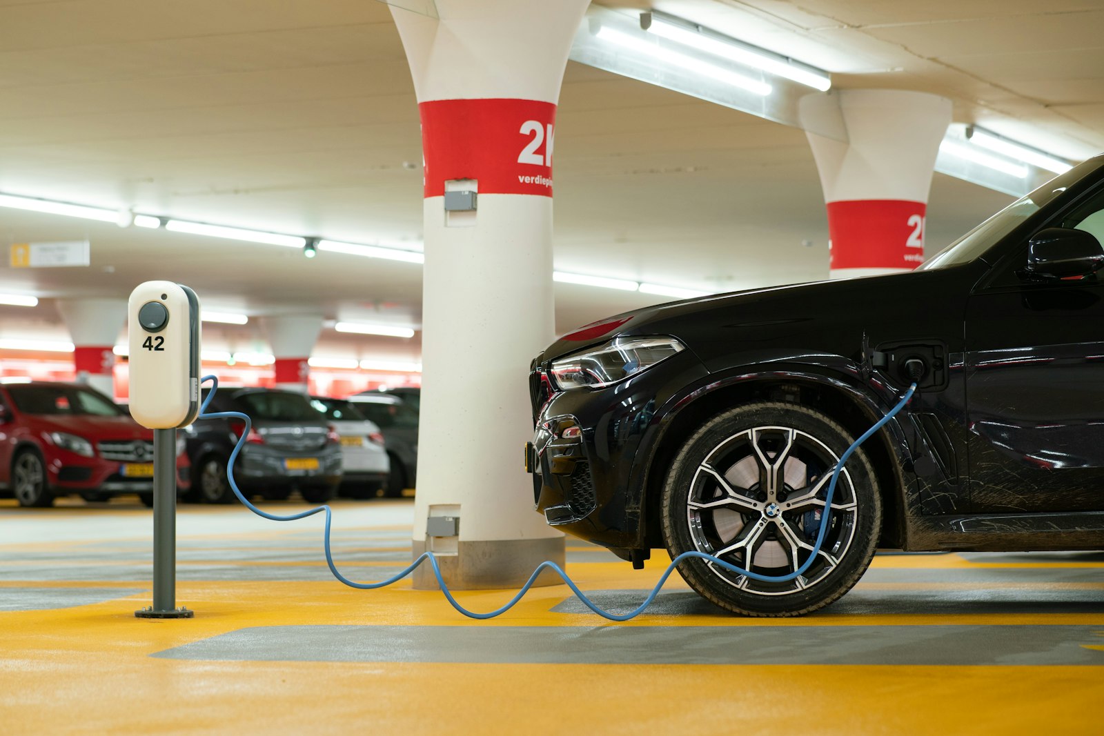 Wall-mounted EV charger installed in a residential garage