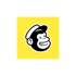 Mailchimp-Logo: Schwarzer Affenkopf mit weißer Kappe und zwinkerndem Auge auf gelbem Quadrat.