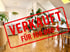 Modernes Wohnzimmer mit Holzboden und Pflanzen, roter Stempel "VERKAUFT FÜR 169.000 €".