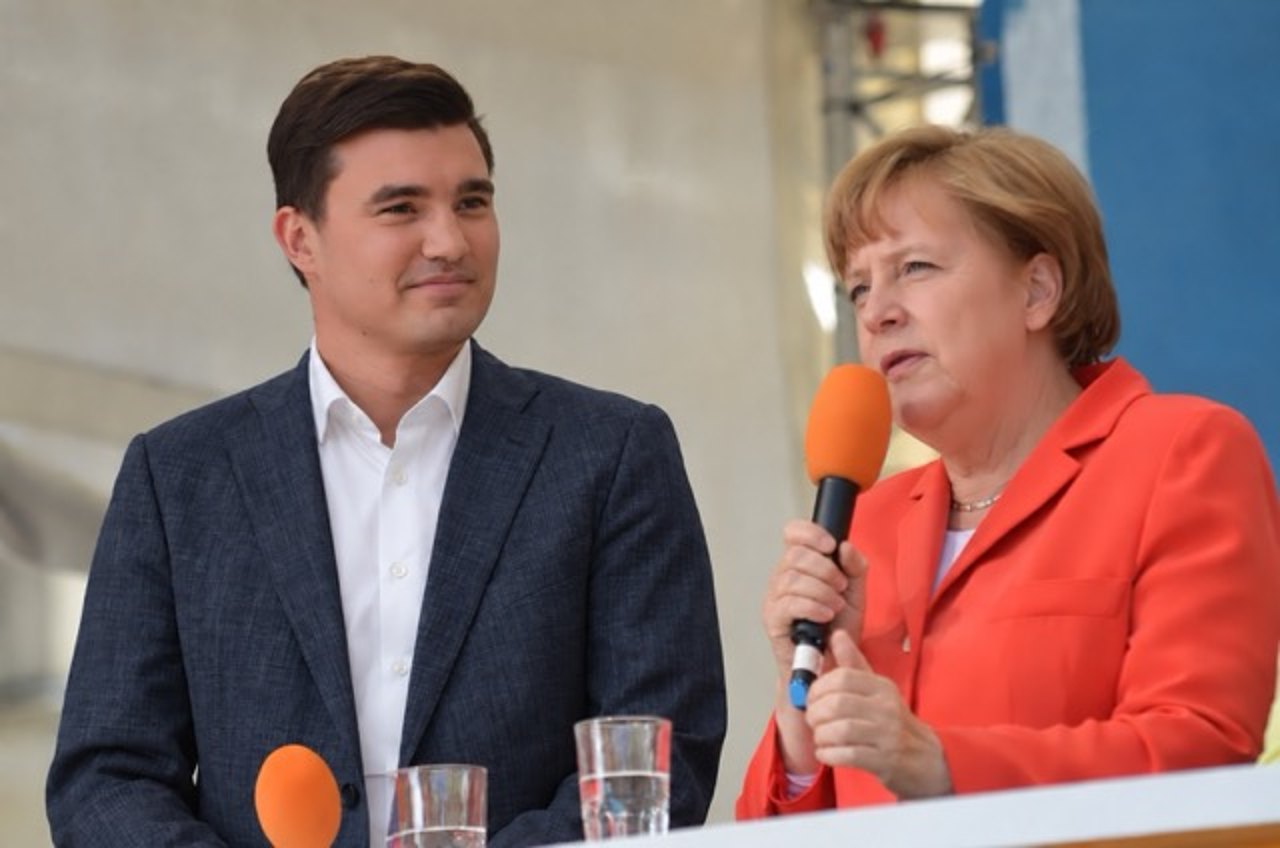 Tim Christopher Gasse mit der damaligen Bundeskanzlerin Dr. Angela Merkel