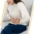 Woman seeks metabolic health support for stomach pain.