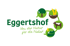 Logo Eggertshof mit Slogan „Von der Natur für die Natur“ sowie Symbolen für Baum, Getreide, Kuh und Biogas.