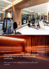 Gym with exercise equipment and a wooden sauna with glowing lights.
