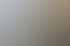 Spezialmaschne auf zwei parallelen Gleisen, mit Oberleitungsmast und Bäumen im Hintergrund.