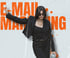 Woman in black suit and sunglasses, with "E-MAIL MARKETING" text in orange behind her.