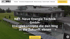 Großes, modernes Gebäude umgeben von Grünflächen und Solarmodulen, mit Text "NET - Neue Energie Technik GmbH".