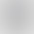 Ein Smartphone mit einem Instagram-Profil "PRIME Autovermietung", das 71 Beiträge und 1.541 Follower zeigt.