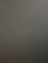 Behandlungsraum mit Liege, Bogenlampe und einem Gerät mit Display, auf dem "FUNCTION SELECT" steht.