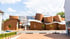 Das Museum Marta Herford mit geschwungener Backsteinarchitektur, Edelstahldach und dem Schriftzug Marta Herford an der Fassade.