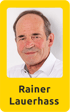 Porträtfoto von Rainer Lauerhass in weißem Hemd, umgeben von einem gelben Rahmen mit abgerundeten Ecken.