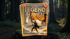 "Legend Haven" book cover featuring a person holding a large orange flag in a forest, "Minerva McGonical" visible.