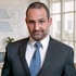Mirko Skuginna, Gründer von SolarLab, vor technischem Büro-Hintergrund – Ihr Ansprechpartner für PV-Webdesign