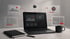 Laptop auf Schreibtisch mit schwebenden Icons für Video, Bild, Text und Layout-Elemente in modernem Design.