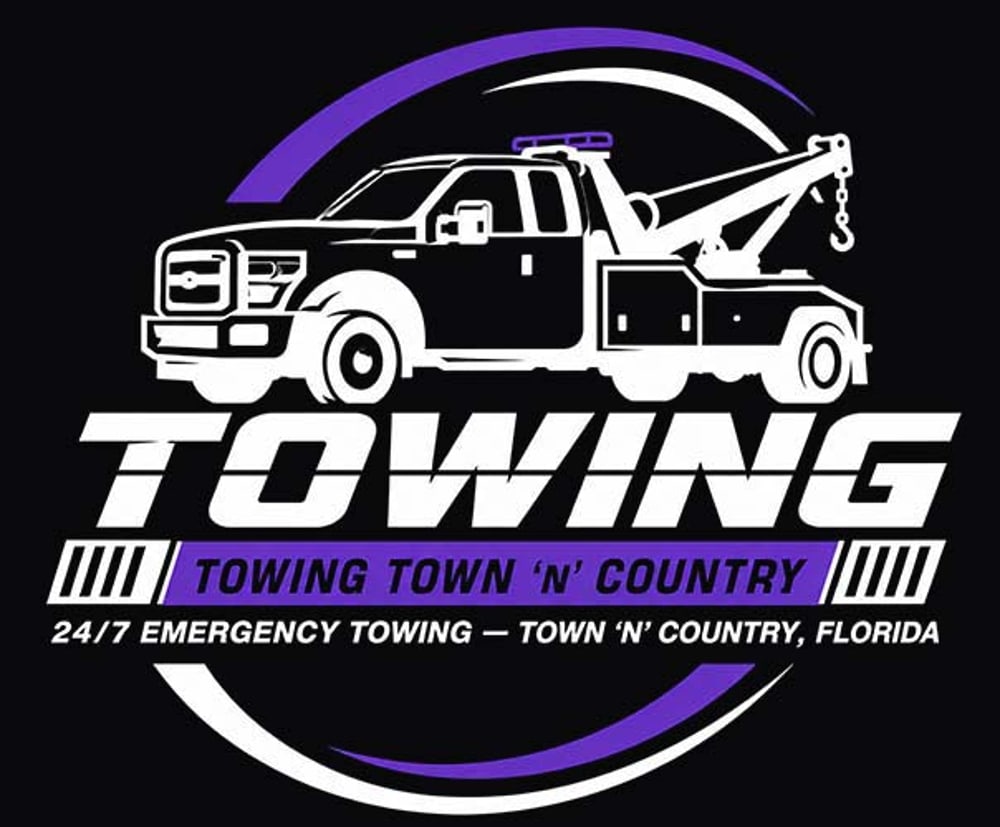 A black and white tow truck with purple accents above bold text reading "TOWING" and "Towing Town 'N' Country" with 24/7 emergency towing in Florida below.