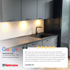 Moderne Küche mit grauen Schränken, Spüle und Wasserhahn, daneben eine Google-Bewertung von Rehmann.