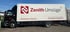 Seitliche Ansicht eines Zenith Umzüge Lkw mit rotem Logo und Schriftzug 'Perfection in Moving' auf weißem Aufbau