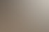 Moderner Gaskamin mit Panoramascheibe, Wiggle Side Chair und minimalistischer Stehlampe in hellem Wohnzimmer.