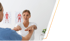 Female patient doing arm exercises with doctor in a pain control clinic