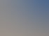 Weißer Mercedes-Benz Actros LKW der Firma WSH Recycling mit Anhänger parkt vor einem Industriegebäude unter blauem Himmel.