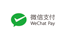 Grünes WeChat Pay-Logo: Sprechblase mit weißem Häkchen, chinesische Schriftzeichen und „WeChat Pay“.