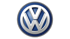 VW-Logo mit silbernen "V" und "W" auf blauem Grund, umrahmt von einem silbernen Kreis.