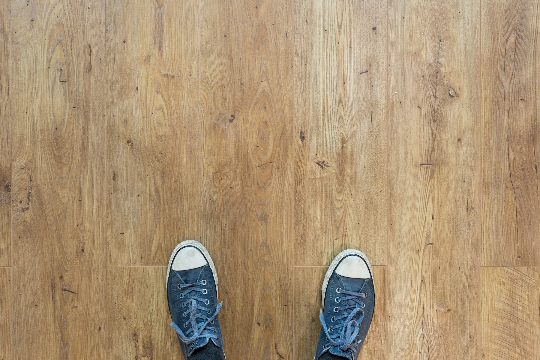 Close view of plank flooring underfoot in a Santa Clara home