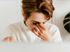 Chronic Fatigue woman rubbing eyes, tired expression
