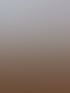 Man in dark clothes walking across a sand dune beside three Arabian oryx, clouds overhead, Dubai desert