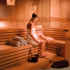 Women relaxing in an Infrared salt sauna therapy session 
