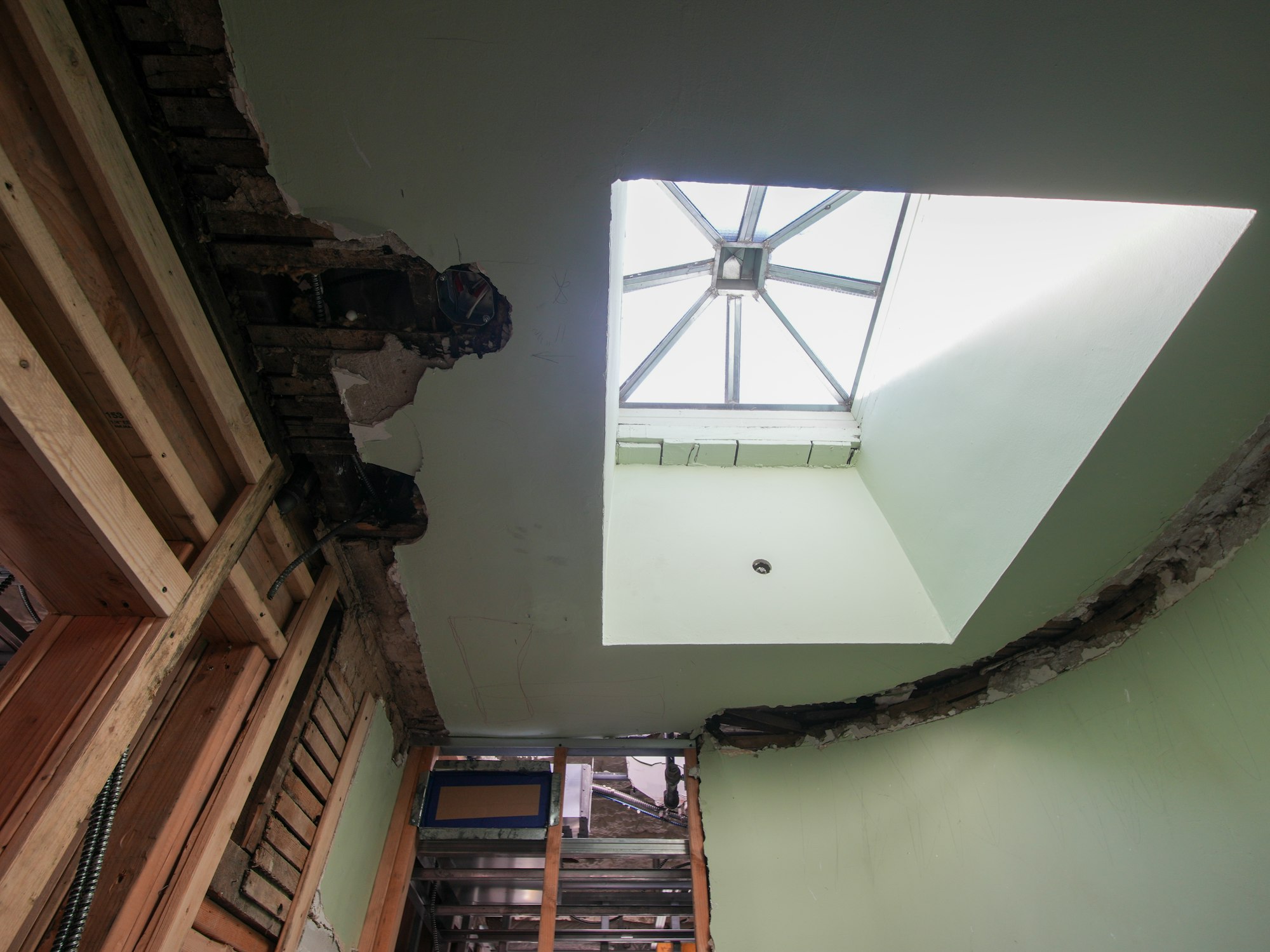 Skylight set into a sloped ceiling during a home renovation, the kind of roof opening that starts leaking on Aledo, TX houses