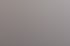 Geometrische Fliesen mit 3D-Würfelmuster in Braun- und Kupfertönen, rechts Übergang zur glatten Fliesenfläche mit Glasabtrennung