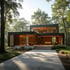Moderner Bungalow mit Einliegerbereich und Glasfassade in Waldrandlage mit minimalistischer Architektur
