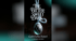 "The Bitter-Sweet Dark" book cover with a hanging, dark, egg-shaped object in a net. Gabriella Batel, A Short Story.