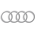 Four interlocking silver rings of the Audi logo.